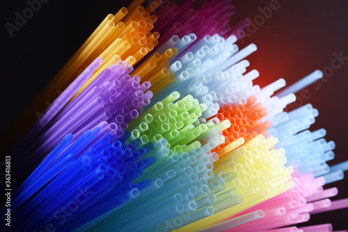 Colorful plastic drinking straws, close up as background photo