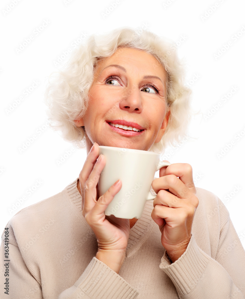 old excited lady smiling laughing, holding cup drinking coffee or tea