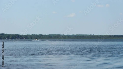 Boating At The Peaceful Kawartha Lakes In Ontario, Canada.  - wide shot photo