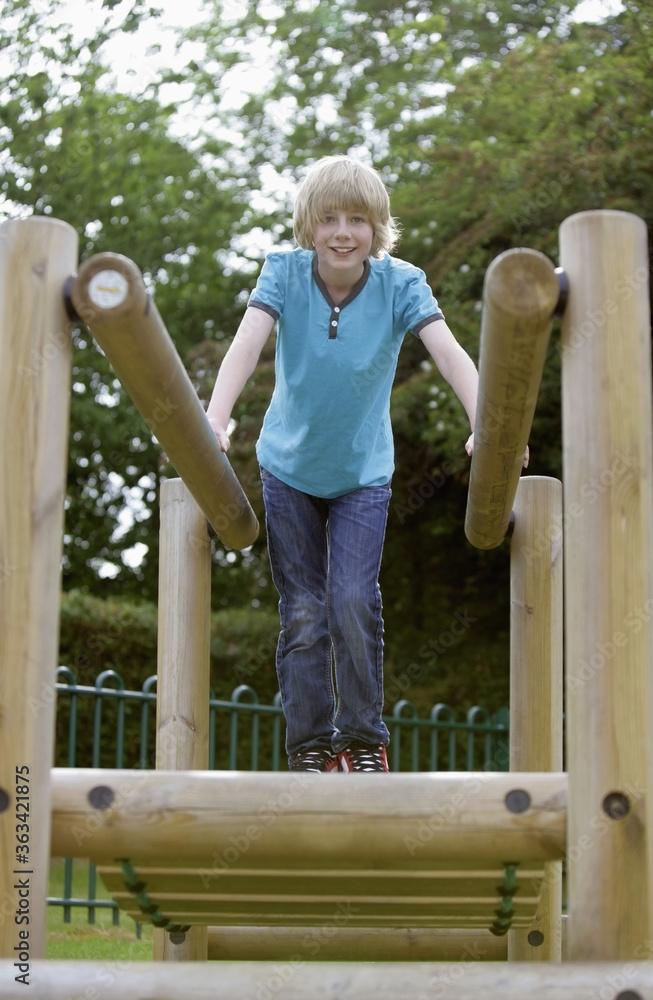 Boy having fun at the playground Boy having fun at the playground
