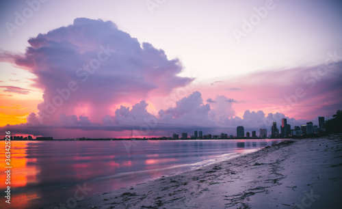 sunset over the beach miami city panorama sky beautiful sun water florida buildings reflection nature 