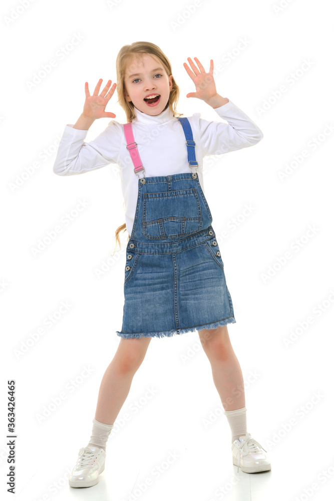 The little girl screams.The concept of children's emotions. The little girl screams.The concept of children's emotions.