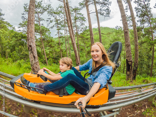 Mother and son on the alpine coaster © galitskaya