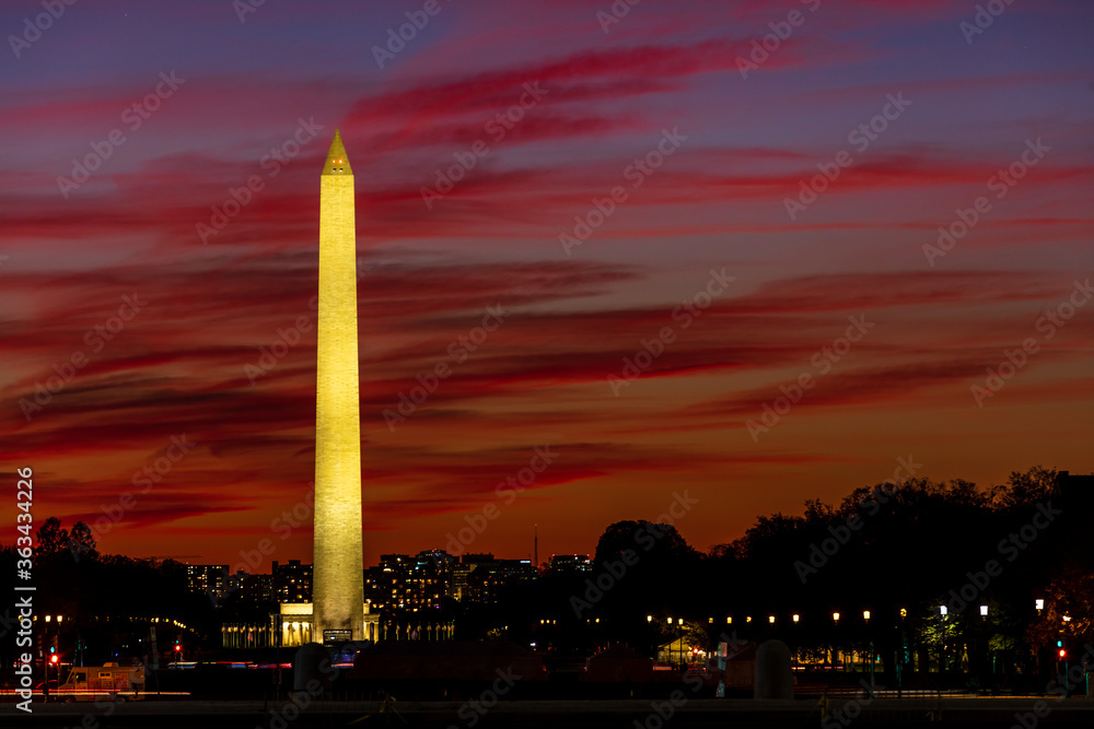 Washington Monument with red cloud  