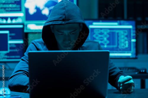 Asian male angry hacker