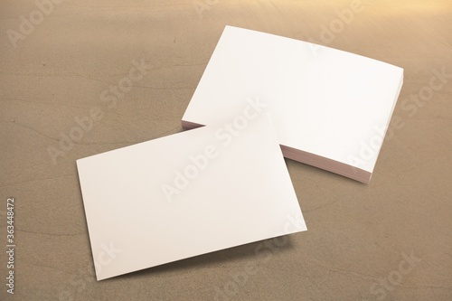 Blank white mockup of sheets or cards on the desk © BillionPhotos.com