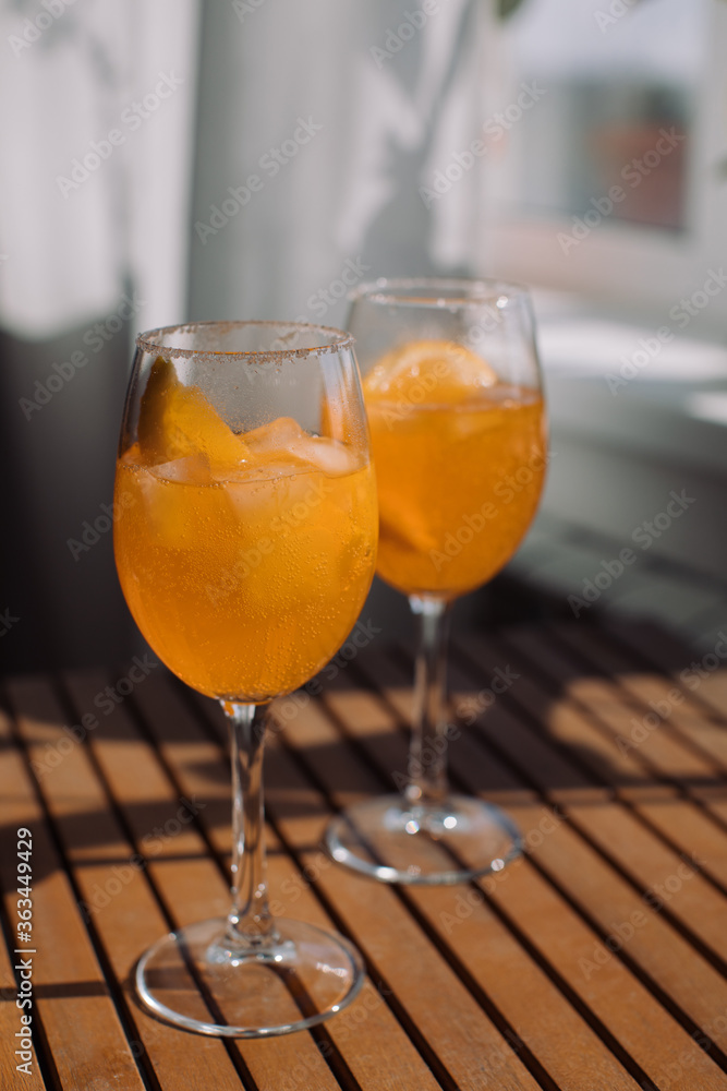 Summer citrus cold alcohol drink Aperol Spritz, closeup. Summer citrus cold alcohol drink Aperol Spritz, closeup.