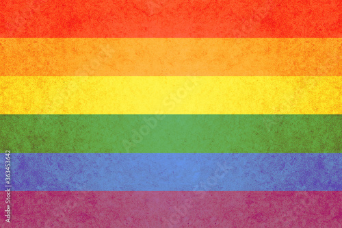 LGBT pride flag or Rainbow pride flag on old paper surface, lgbtq+