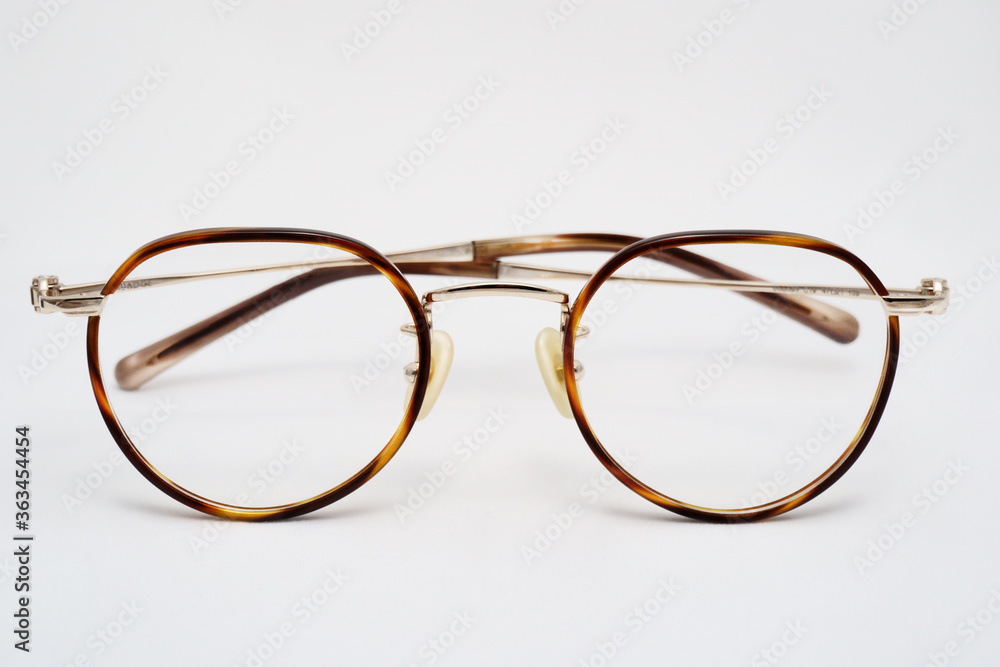 Stylish non-branded glasses with clean retouching on isolated background Stylish non-branded glasses with clean retouching on isolated background