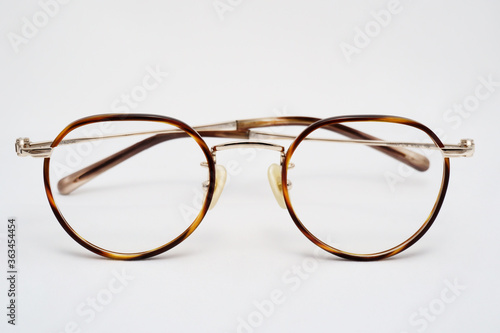 Stylish non-branded glasses with clean retouching on isolated background