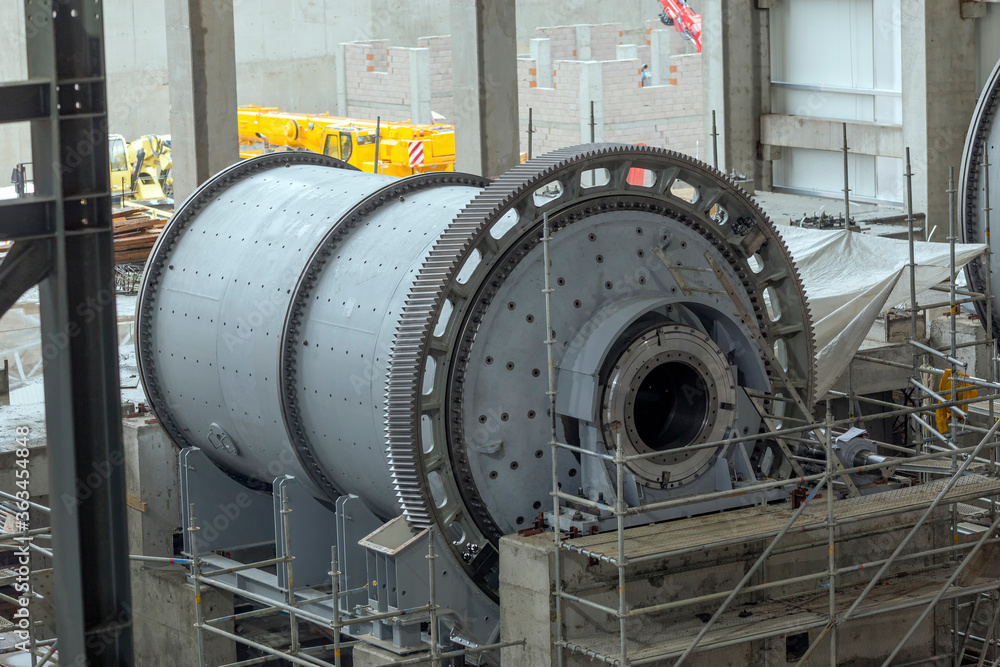 View of the large sag and ball mill in the mine factory. A ball mill is