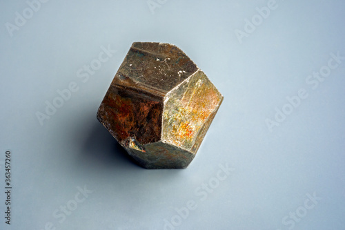 View of the cubic pyrite. The mineral pyrite or iron pyrite, also known as fool's gold, is an iron sulfide with the chemical formula FeS2. Pyrite is considered the most common of the sulfide minerals. photo