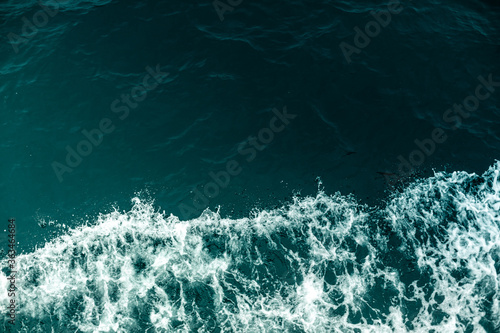 waves on the beach © ArdichawatSripaiboo