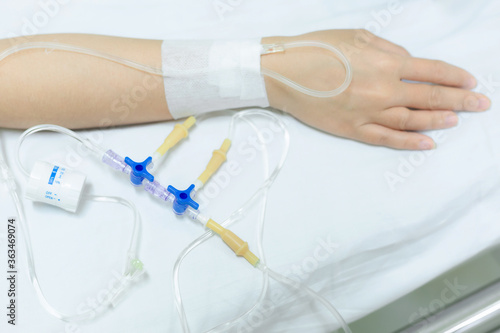 Close up of a woman patient in hospital with saline intravenous