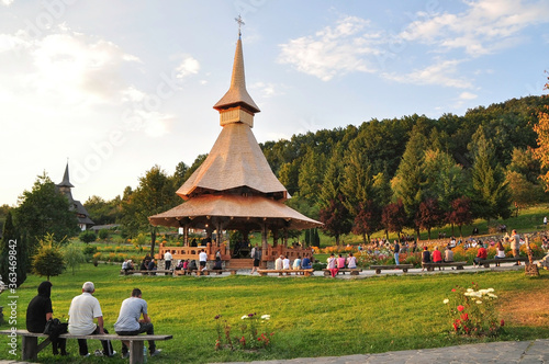 Barsana Monastery, Maramures, Romania, Europe, spring 2018. Celebration of August 14 in the afternoon at the Barsana Orthodox Monastery. It is one of the main points of interest in the Maramures area. photo