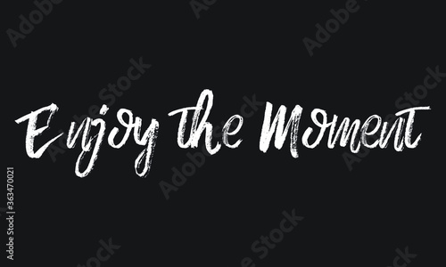 Enjoy the Moment Chalk white text lettering typography and Calligraphy phrase isolated on the Black background 