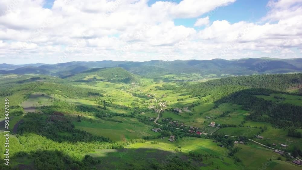 Aerial view of mountains and forests filmed on a drone. Carpathian .Lush beautiful green valleys. 4K UHD drone footage. Aerial view of mountains and forests filmed on a drone. Carpathian .Lush beautiful green valleys. 4K UHD drone footage.