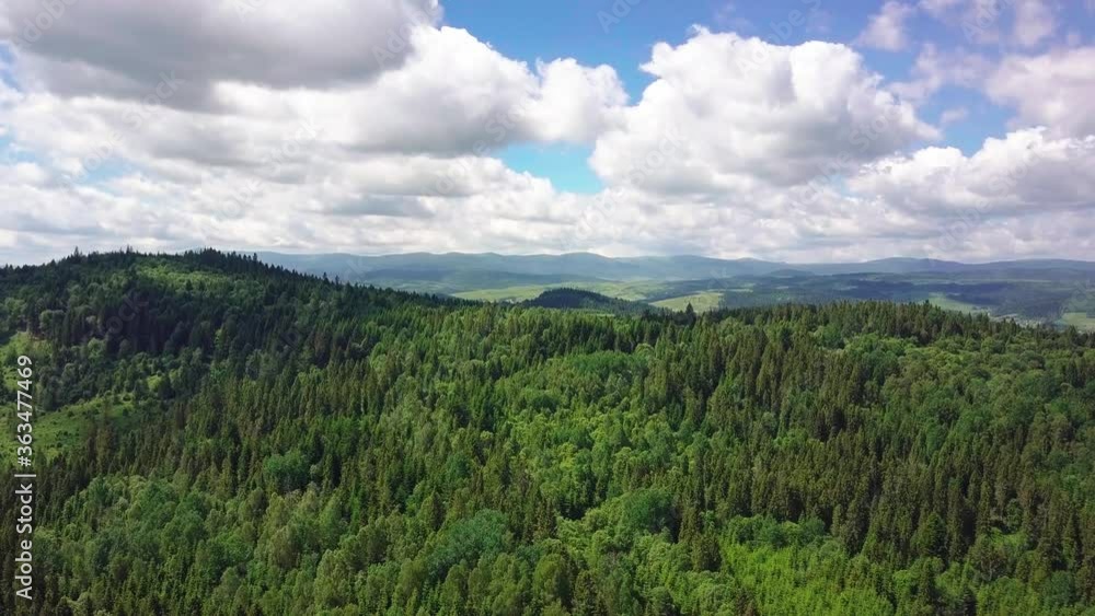 Aerial view of mountains and forests filmed on a drone. Carpathian .Lush beautiful green valleys. 4K UHD drone footage. Aerial view of mountains and forests filmed on a drone. Carpathian .Lush beautiful green valleys. 4K UHD drone footage.