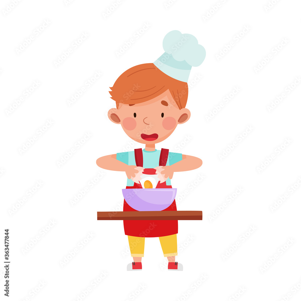 Cute Boy Character in Hat and Apron Standing at Kitchen Table and Breaking Eggs in Bowl Vector Illustration