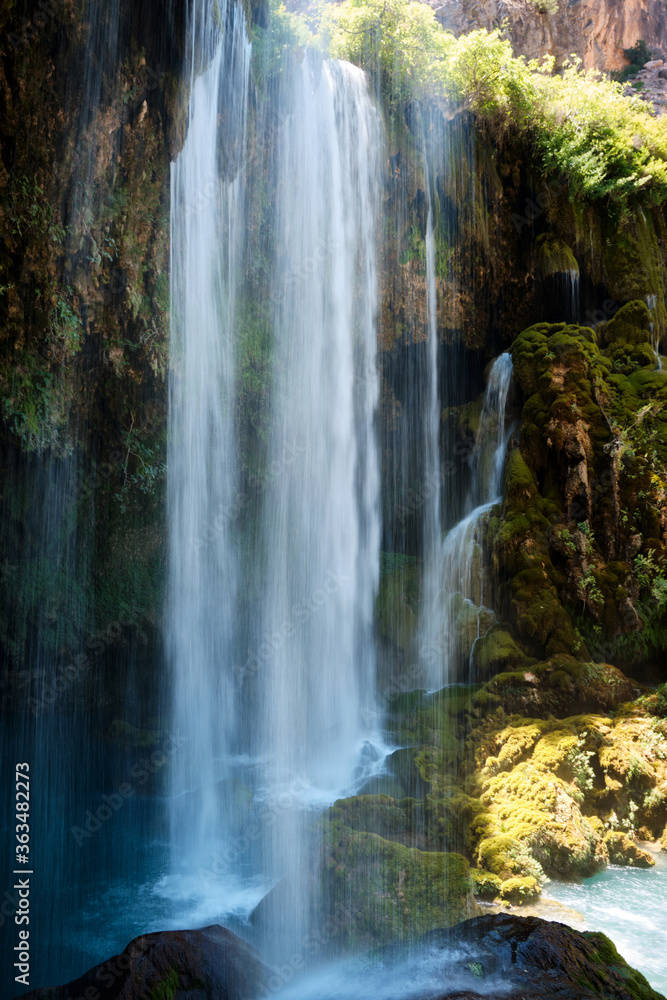Crystal clear water of waterfall shot with long exposure. Yerkopru waterfall, Ermenek river, Mut, Mersin province,Turkey Crystal clear water of waterfall shot with long exposure. Yerkopru waterfall, Ermenek river, Mut, Mersin province,Turkey