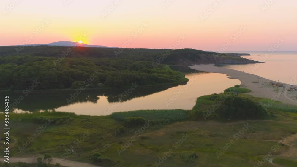 Aerial drone view of sunset over Veleka River estuary and Sinemorets Shore, Bulgaria Aerial drone view of sunset over Veleka River estuary and Sinemorets Shore, Bulgaria
