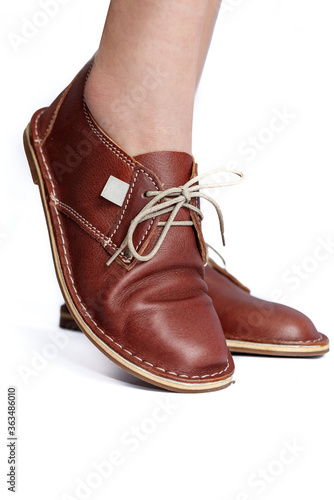Ladies brown leather vintage shoes isolated close-up