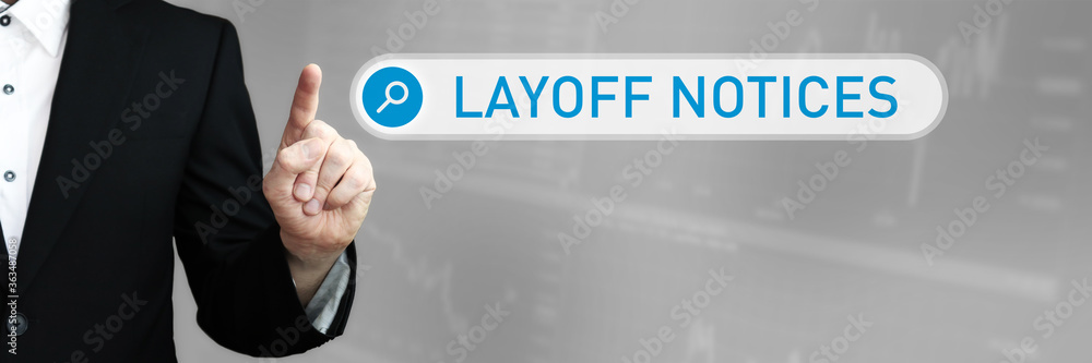 Layoff notices. Businessman (Man) in a suit pointing with his finger to a search box. The word is in focus. Blue Background. Business, Finance, Statistics, Analysis, Economy Layoff notices. Businessman (Man) in a suit pointing with his finger to a search box. The word is in focus. Blue Background. Business, Finance, Statistics, Analysis, Economy