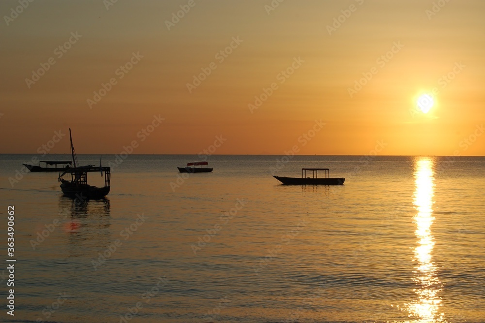 Boats on the sunset horizon of Zanzibar, Tanzania 