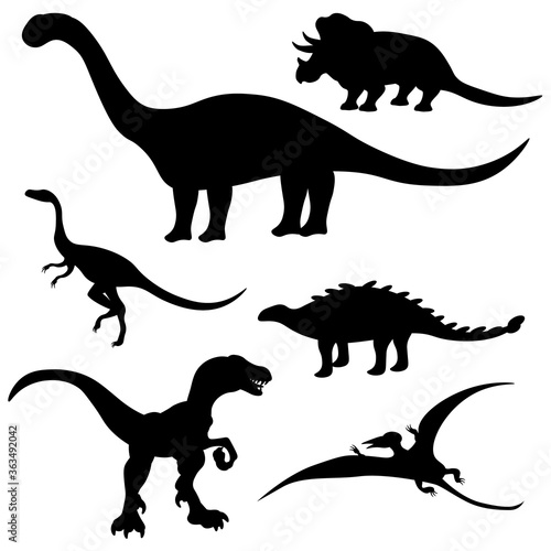 Vector set of different dinosaur silhouettes on a white isolated background.