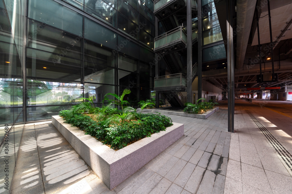 Modern glass elevator and pedestrian stairway entrances. Modern glass elevator and pedestrian stairway entrances.