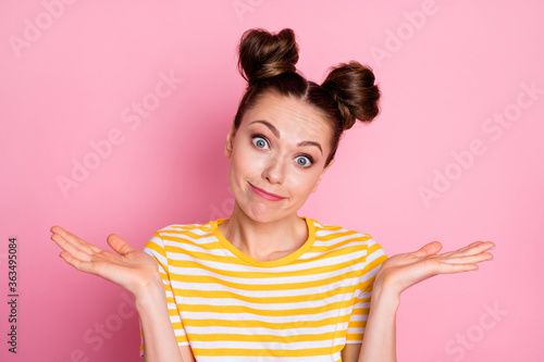 Close-up portrait of her she nice-looking attractive lovely pretty charming cute ignorant cheery girl shrugging shoulders don't know isolated over pink pastel color background