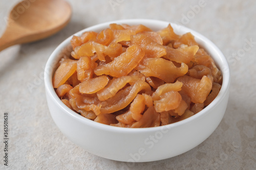 Pickle turnip in white bowl.