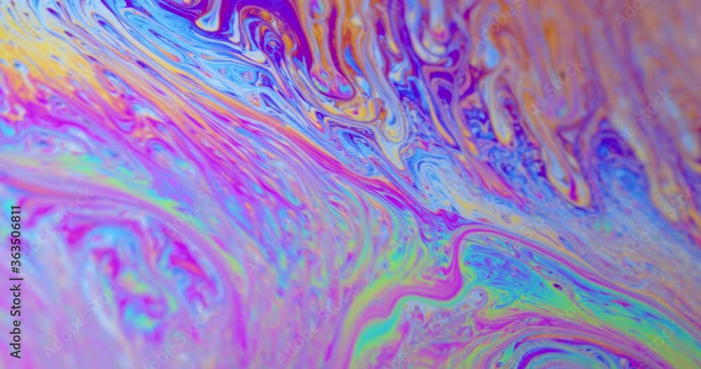 Surface of Liquid Soap with Changing Rainbow Colours. Macro. Surface of Liquid Soap with Changing Rainbow Colours. Macro.
