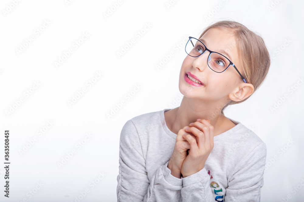 girl teenager in glasses for vision in the studio