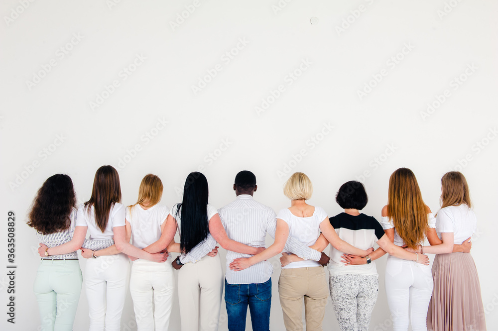 Obraz premium group of people holding a blank board