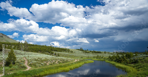 Calm river under cloudy sky in Yellowstone national park