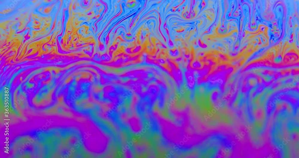 Surface of Liquid Soap with Changing Rainbow Colours. Macro. Surface of Liquid Soap with Changing Rainbow Colours. Macro.
