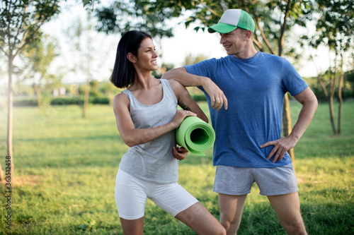 Young couple exercise together outdoors healthy lifestyle. Sport couple. Fitness. Couple in love. 