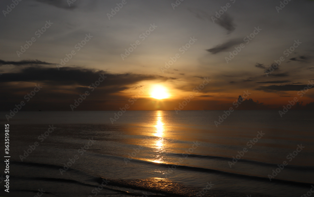 soft lens sunrise on the beach
