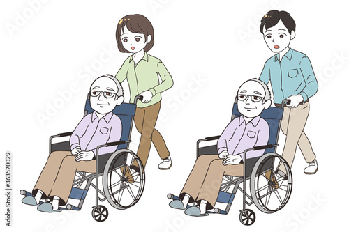 高齢男性を怪訝な表情で介護する家族