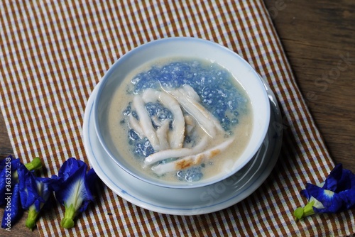 Sago and  young coconut  in coconut milk on  table cloth   prepare for serving  in the  kitchen    Thai  dessert  image for background   selective focus .