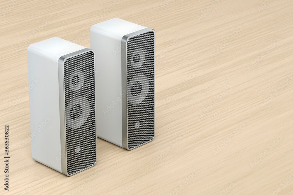Fototapeta premium Stereo computer speakers on wooden desk