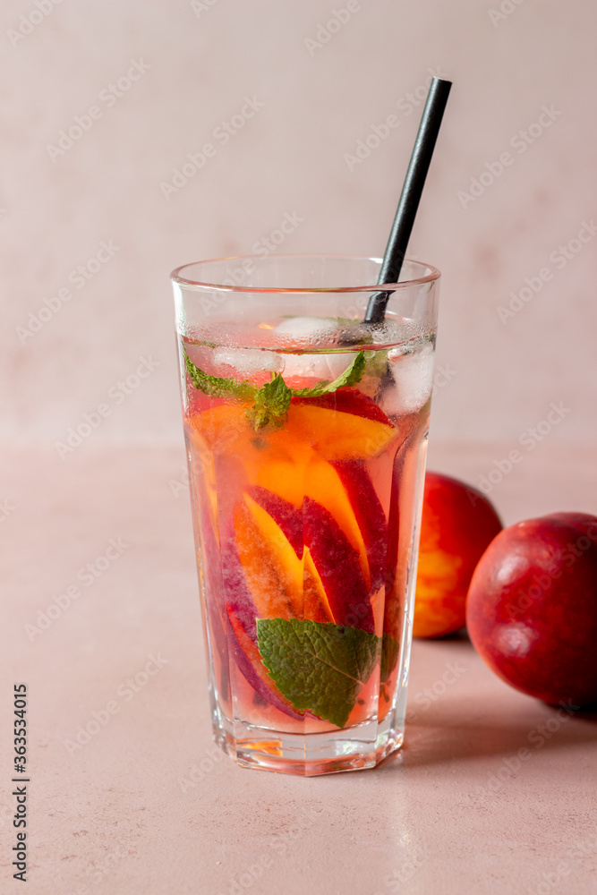 Cold peach tea with mint. Cold drinks. Healthy eating. Vegetarian food. Cold peach tea with mint. Cold drinks. Healthy eating. Vegetarian food.