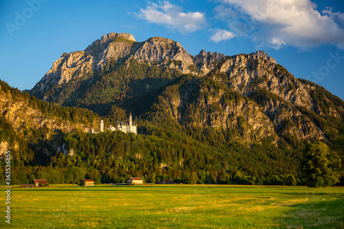 Neuschwanstein Castle with Alps in the evening light, Germany