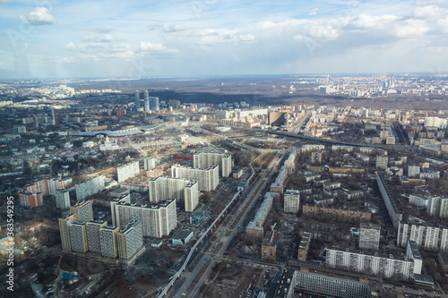 Russia, Moscow, 2019: view from the Ostankino TV tower to different houses and the monorail in the VDNKh metro area