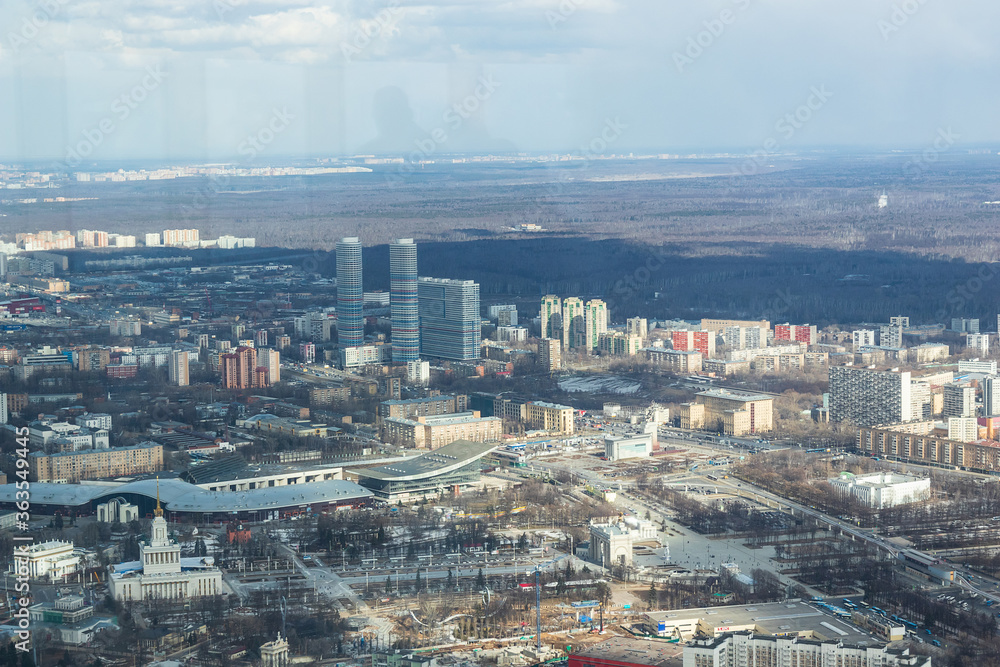 Russia, Moscow, 2019: view from the Ostankino TV tower to the panorama of the city, towards the VDNKh metro station and the Rostokino district