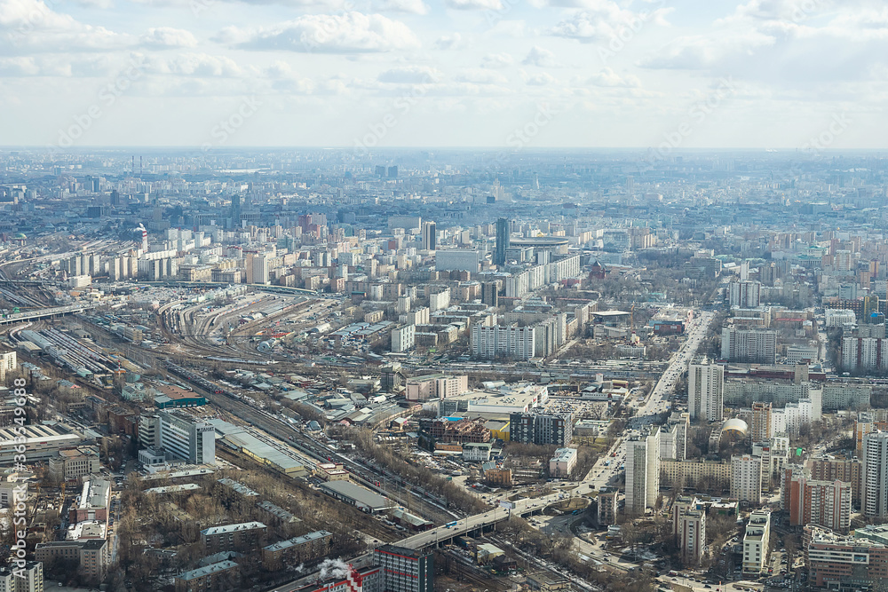 Russia, Moscow, 2019: view from the Ostankino TV tower on a panorama of the city with railway tracks and wagons