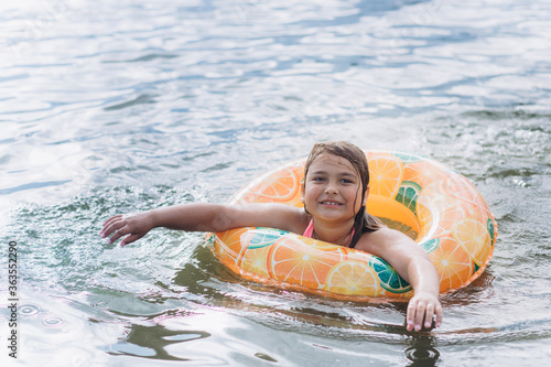 Young girl portrait on sea. Swimming children activity  © Andreshkova Nastya