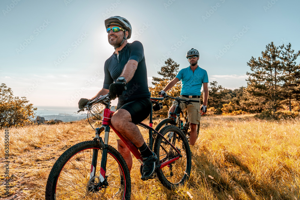 Man riding his mountain bike outdoor in nature