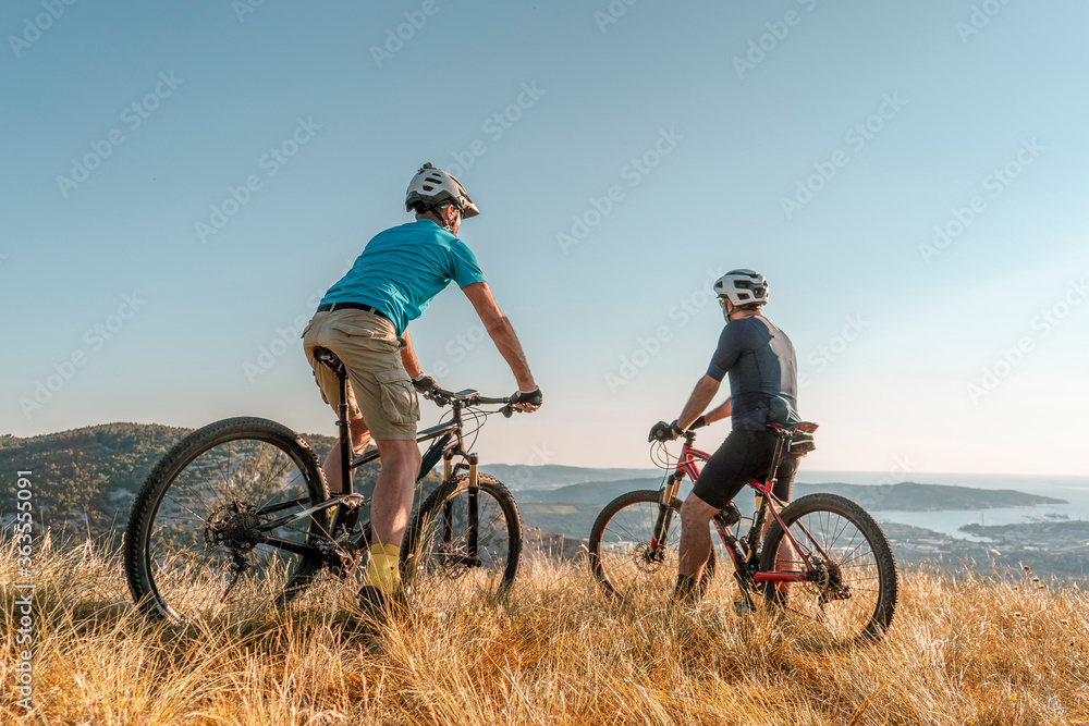 Man riding his mountain bike outdoor in nature Man riding his mountain bike outdoor in nature